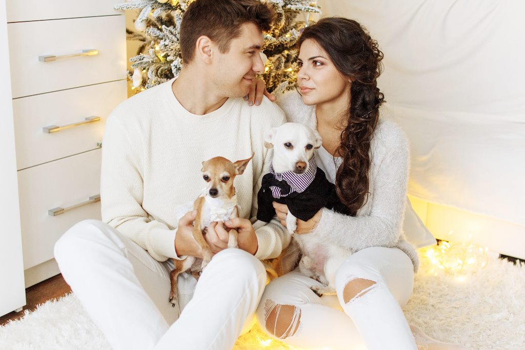 man and wife with dogs